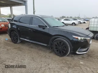 2016 Mazda CX-9 Signature with VIN JM3TCBEYXG0112479, listed as a Copart auction lot 55185145 with 204,619 mi miles and Clean title. Bid and sale history available at DreamBid. Image 4.
