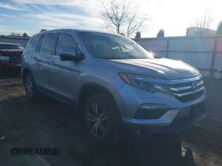 2017 Honda Pilot EX-L with VIN 5FNYF5H55HB031708, listed as a IAAI auction lot 41692811 with 138,180 mi miles. Bid and sale history available at carsss.com. Image 1.