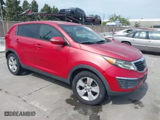 2013 Kia Sportage LX with VIN KNDPBCA26D7355889, listed as a IAAI auction lot 42054415 with 136,859 mi miles. Bid and sale history available at carsss.com. Image 1.