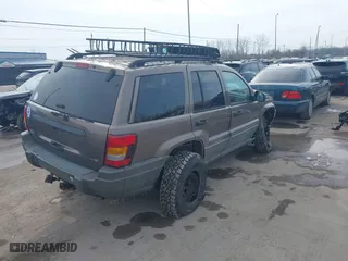 2002 Jeep Grand Cherokee Laredo with VIN 1J4GW48N12C193792, listed as a IAAI auction lot 41545283 with 166,720 mi miles. Bid and sale history available at carsss.com. Image 4.