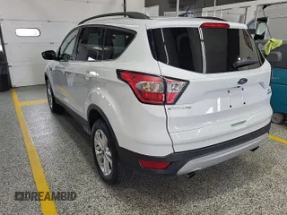 2018 Ford Escape SE z VIN 1FMCU9GD3JUC89119, wystawiony jako IAAI lot #42421139 z przebiegiem 42 209 mil mil oraz . Historia ofert i sprzedaży dostępna na DreamBid. Obrazek 13.
