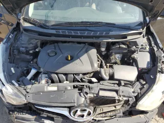 2015 Hyundai Elantra SE z VIN 5NPDH4AE5FH610483, wystawiony jako Copart lot #56893235 z przebiegiem 122 392 mil mil oraz Tytuł czysty. Historia ofert i sprzedaży dostępna na DreamBid. Obrazek 11.