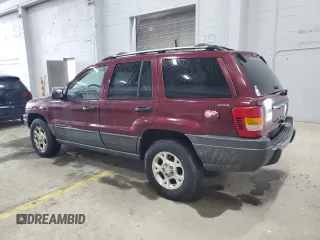 2001 Jeep Grand Cherokee Laredo with VIN 1J4GW48S11C618478, listed as a Copart auction lot 57889965 with Not provided miles and Clean title. Bid and sale history available at DreamBid. Image 2.