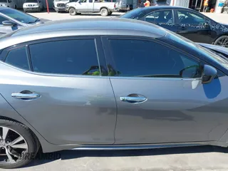 2016 Nissan Maxima SR with VIN 1N4AA6AP9GC414943, listed as a IAAI auction lot 41976295 with 154,738 mi miles and . Bid and sale history available at DreamBid. Image 14.