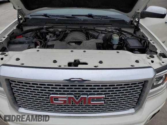 2014 GMC Sierra 1500 Denali z VIN 3GTP1WEC3EG323320, wystawiony jako Copart lot #81966444 z przebiegiem Nie podano mil oraz Szkoda całkowita • Salvage title. Historia ofert i sprzedaży dostępna na DreamBid. Obrazek 11.