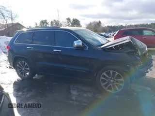 2017 Jeep Grand Cherokee Overland with VIN 1C4RJFCG8HC835645, listed as a IAAI auction lot 41442765 with 95,324 mi miles and . Bid and sale history available at DreamBid. Image 14.