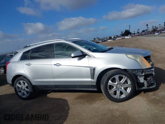 2014 Cadillac SRX Performance Collection with VIN 3GYFNCE39ES544135, listed as a IAAI auction lot 41808644 with 145,772 mi miles and . Bid and sale history available at carsss.com. Image 14.