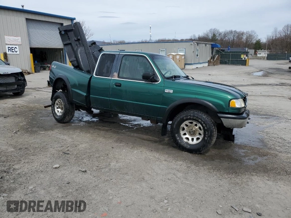 1999 Mazda B-Series Truck SE with VIN 4F4ZR17X2XTM25631, listed as a Copart auction lot 51625715 with 204,134 mi miles and Salvage Title. Bid and sale history available at DreamBid. Image 4.