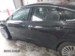 2013 Ford Fusion Titanium Hybrid with VIN 3FA6P0RU4DR281789, listed as a IAAI auction lot 41909115 with 161,008 mi miles and . Bid and sale history available at DreamBid. Image 15.
