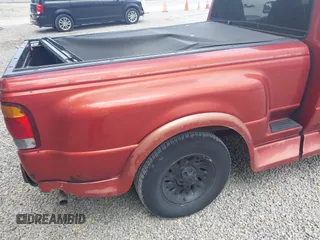 1999 Ford Ranger XL with VIN 1FTYR10C8XPA61560, listed as a IAAI auction lot 42683645 with 186,681 mi miles and . Bid and sale history available at DreamBid. Image 12.
