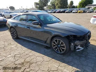 2023 BMW i4 eDrive40 with VIN WBY73AW08PFN97116, listed as a Copart auction lot 67344213 with 12,299 mi miles. Bid and sale history available at carsss.com. Image 4.