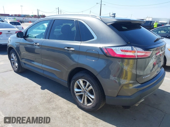 2019 Ford Edge SEL with VIN 2FMPK3J9XKBB76512, listed as a IAAI auction lot 42498683 with 119,513 mi miles and . Bid and sale history available at DreamBid. Image 3.