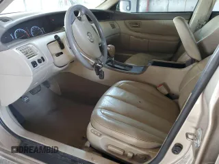 2002 Toyota Avalon XL with VIN 4T1BF28B42U254696, listed as a Copart auction lot 53679355 with 168,828 mi miles and Salvage Title. Bid and sale history available at DreamBid. Image 7.