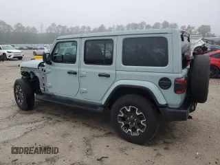 2024 Jeep Wrangler Sahara with VIN 1C4PJXEGXRW210206, listed as a Copart auction lot 58059115 with 14,492 mi miles and Salvage title. Bid and sale history available at DreamBid. Image 2.