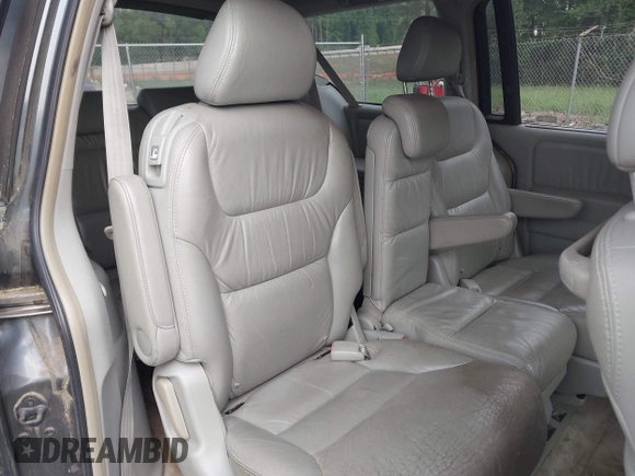 2006 Honda Odyssey EX-L z VIN 5FNRL38756B420817, wystawiony jako IAAI lot #42101271 z przebiegiem 203 892 mil mil oraz . Historia ofert i sprzedaży dostępna na DreamBid. Obrazek 8.