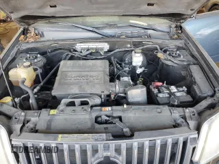 2010 Mercury Mariner Premier z VIN 4M2CN8HG3AKJ29557, wystawiony jako Copart lot #53318115 z przebiegiem 141 895 mil mil oraz Szkoda całkowita • Salvage title. Historia ofert i sprzedaży dostępna na DreamBid. Obrazek 12.