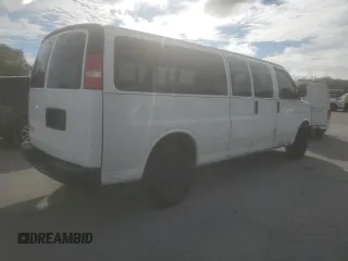 2014 Chevrolet Express Passenger 1LS with VIN 1GAZGZFAXE1105162, listed as a Copart auction lot 72773154 with 97,950 mi miles and Salvage title. Bid and sale history available at DreamBid. Image 3.