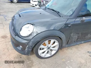 2013 MINI Hardtop S with VIN WMWSV3C50DT394345, listed as a IAAI auction lot 41738216 with 58,241 mi miles and . Bid and sale history available at DreamBid. Image 6.