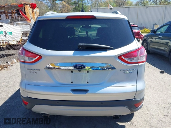 2016 Ford Escape Titanium with VIN 1FMCU9JXXGUA51537, listed as a IAAI auction lot 42118922 with 109,439 mi miles. Bid and sale history available at carsss.com. Image 16.