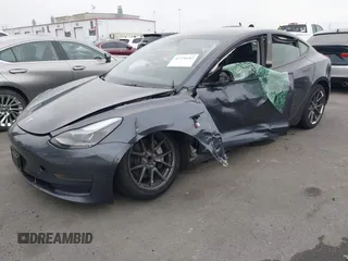2023 Tesla Model 3 with VIN 5YJ3E1EA4PF705949, listed as a IAAI auction lot 42336682 with 88,056 mi miles and . Bid and sale history available at DreamBid. Image 21.