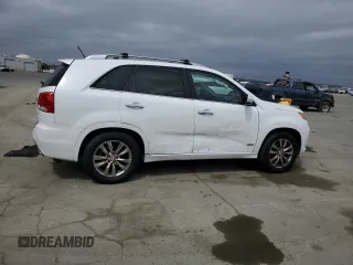 2012 Kia Sorento SX z VIN 5XYKWDA25CG280219, wystawiony jako Copart lot #54397025 z przebiegiem 197 685 mil mil oraz Szkoda całkowita • Salvage title. Historia ofert i sprzedaży dostępna na DreamBid. Obrazek 3.
