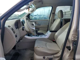 2007 Mercury Mariner Premier z VIN 4M2CU87147KJ17376, wystawiony jako Copart lot #51513755 z przebiegiem 93 763 mil mil oraz Szkody całkowita. Historia ofert i sprzedaży dostępna na DreamBid. Obrazek 7.