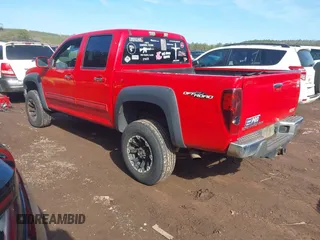 2012 GMC Canyon SLE1 with VIN 1GTH6MFE9C8107145, listed as a IAAI auction lot 41440495 with 218,557 mi miles. Bid and sale history available at carsss.com. Image 3.