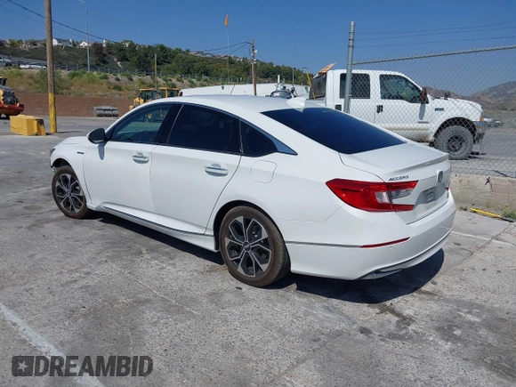 2021 Honda Accord Touring with VIN 1HGCV3F95MA000714, listed as a IAAI auction lot 42350127 with 69,731 mi miles and . Bid and sale history available at DreamBid. Image 3.
