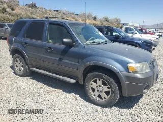 2005 Ford Escape XLT with VIN 1FMCU93105KA43061, listed as a Copart auction lot 62324555 with 121,517 mi miles and Salvage title. Bid and sale history available at DreamBid. Image 4.