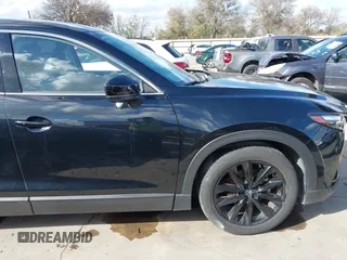 2023 Mazda CX-9 Touring Plus with VIN JM3TCBAY2P0657761, listed as a IAAI auction lot 41125586 with 12,425 mi miles and . Bid and sale history available at DreamBid. Image 21.
