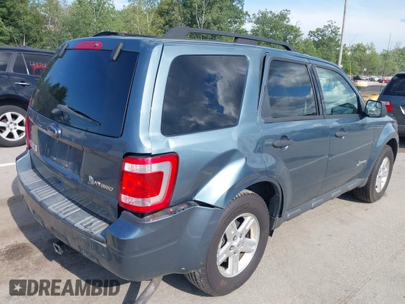 2011 Ford Escape Hybrid z VIN 1FMCU5K37BKB86287, wystawiony jako IAAI lot #42683149 z przebiegiem 151 972 mil mil oraz . Historia ofert i sprzedaży dostępna na DreamBid. Obrazek 6.