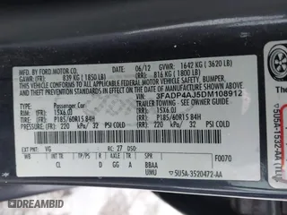 2013 Ford Fiesta S with VIN 3FADP4AJ5DM108912, listed as a IAAI auction lot 41303804 with 100,865 mi miles. Bid and sale history available at carsss.com. Image 9.