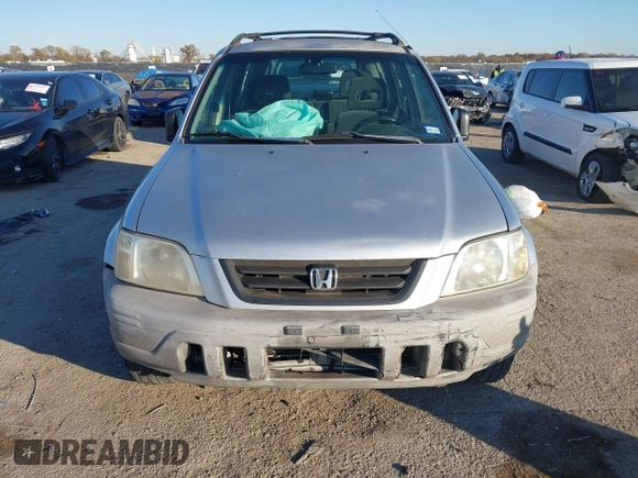1999 Honda CR-V LX with VIN JHLRD284XXC019021, listed as a IAAI auction lot 41031098 with 204,206 mi miles. Bid and sale history available at carsss.com. Image 12.