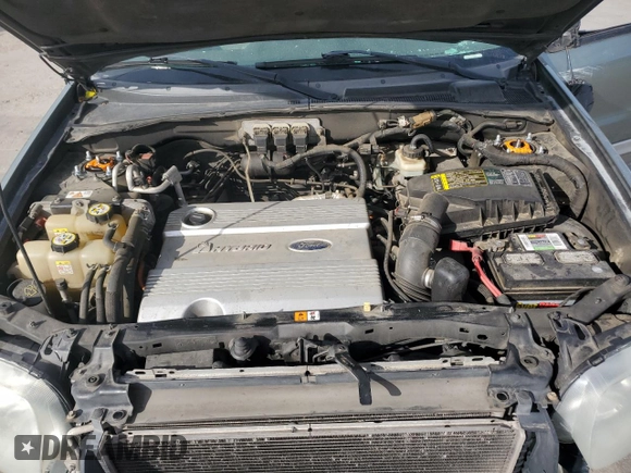2005 Ford Escape Hybrid z VIN 1FMCU95HX5KE24619, wystawiony jako Copart lot #60624765 z przebiegiem 209 937 mil mil oraz Nie do naprawy • Non repairable. Historia ofert i sprzedaży dostępna na DreamBid. Obrazek 12.