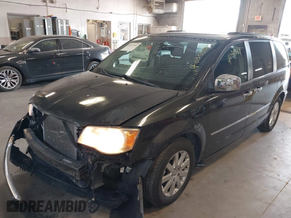 2011 Chrysler Town & Country Touring L z VIN 2A4RR8DG6BR798395, wystawiony jako IAAI lot #41084235 z przebiegiem 129 778 mil mil oraz . Historia ofert i sprzedaży dostępna na DreamBid. Obrazek 2.