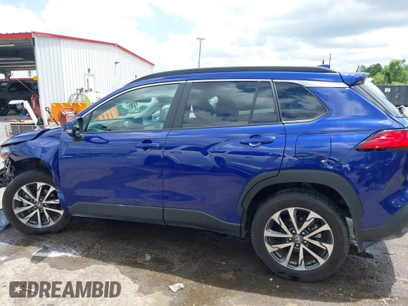 2023 Toyota Corolla Cross XLE with VIN 7MUEAAAG7PV065106, listed as a IAAI auction lot 42168195 with 6,519 mi miles and . Bid and sale history available at DreamBid. Image 14.