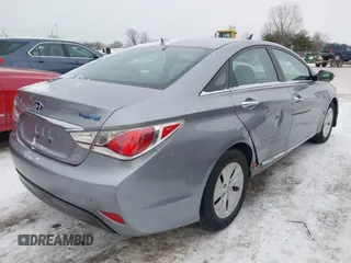 2014 Hyundai Sonata Hybrid Limited with VIN KMHEC4A4XEA117023, listed as a IAAI auction lot 41299461 with 154,822 mi miles. Bid and sale history available at carsss.com. Image 4.