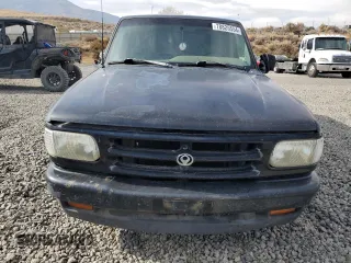 1994 Mazda B-Series Truck z VIN 4F4CR12AXRTM29986, wystawiony jako Copart lot #78825554 z przebiegiem 183 595 mil mil oraz Szkoda całkowita • Salvage title. Historia ofert i sprzedaży dostępna na DreamBid. Obrazek 5.