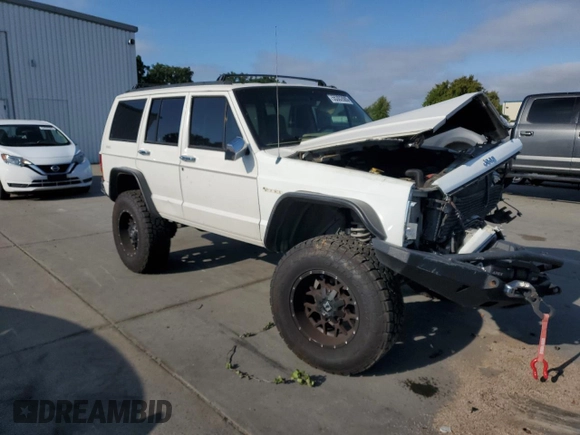 1996 Jeep Cherokee SE z VIN 1J4FJ28S7TL270218, wystawiony jako Copart lot #55302885 z przebiegiem 239 209 mil mil oraz Szkoda całkowita • Salvage title. Historia ofert i sprzedaży dostępna na DreamBid. Obrazek 4.