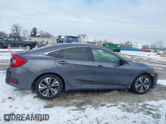 2017 Honda Civic EX-T with VIN 19XFC1E38HE031851, listed as a IAAI auction lot 41625294 with 97,432 mi miles and . Bid and sale history available at DreamBid. Image 14.