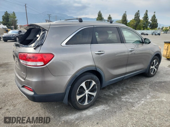 2016 Kia Sorento EX with VIN 5XYPH4A54GG094512, listed as a Copart auction lot 64965125 with 162,565 mi miles and Salvage title. Bid and sale history available at DreamBid. Image 3.