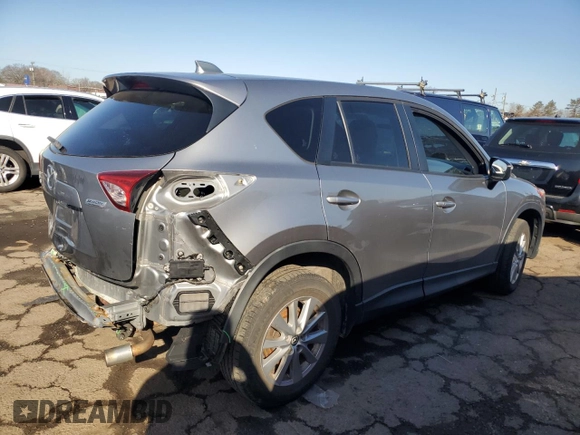 2015 Mazda CX-5 Touring with VIN JM3KE4CY5F0506569, listed as a Copart auction lot 49441035 with 160,077 mi miles and Salvage Title. Bid and sale history available at DreamBid. Image 3.