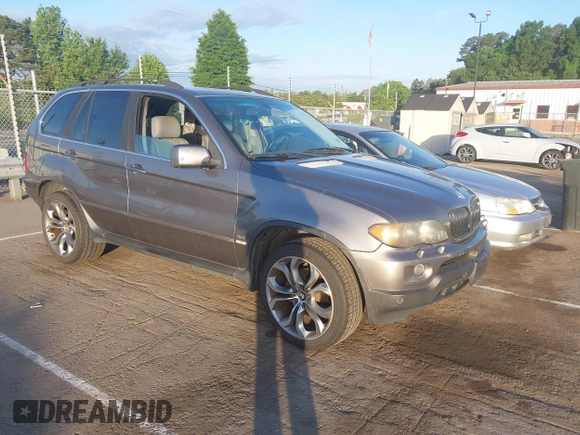 2004 BMW X5 4.4i with VIN 5UXFB53514LV09431, listed as a IAAI auction lot 42142099 with 181,951 mi miles. Bid and sale history available at carsss.com. Image 1.