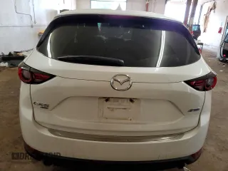 2018 Mazda CX-5 Grand Touring with VIN JM3KFBDM6J0455993, listed as a Copart auction lot 61414275 with 77,570 mi miles and Salvage title. Bid and sale history available at DreamBid. Image 6.