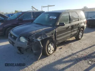 2004 Ford Escape XLS with VIN 1FMYU921X4KA14947, listed as a Copart auction lot 71589544 with 173,890 mi miles and Salvage Title. Bid and sale history available at DreamBid. Image 1.