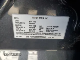 2024 Tesla Model Y Long Range with VIN 7SAYGDEE4RA299503, listed as a Copart auction lot 61950585 with 17,077 mi miles and Salvage title. Bid and sale history available at DreamBid. Image 12.