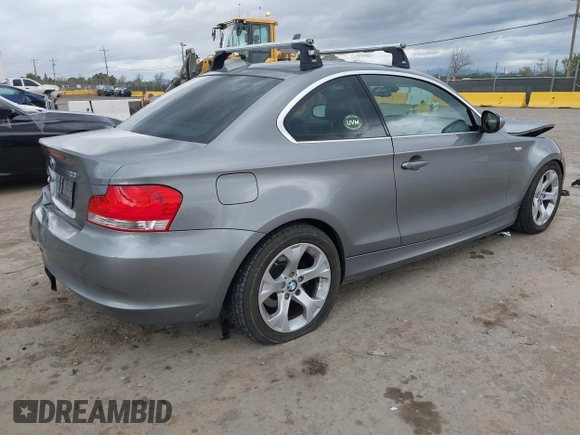 2010 BMW 1 Series 128i with VIN WBAUP9C52AVL89282, listed as a IAAI auction lot 41787668 with 152,976 mi miles and . Bid and sale history available at DreamBid. Image 4.