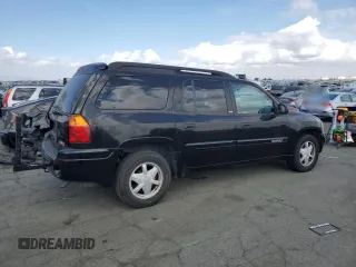 2003 GMC Envoy SLT with VIN 1GKES16SX36220489, listed as a Copart auction lot 71859834 with 148,811 mi miles and Salvage Title. Bid and sale history available at DreamBid. Image 3.
