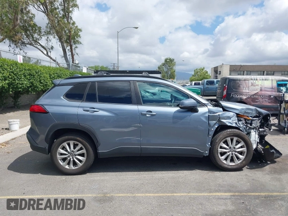 2022 Toyota Corolla Cross LE with VIN 7MUBAAAG1NV004852, listed as a IAAI auction lot 42251301 with 50,197 mi miles and . Bid and sale history available at DreamBid. Image 14.