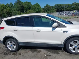 2013 Ford Escape SE with VIN 1FMCU0GX2DUB85361, listed as a IAAI auction lot 42552881 with 211,032 mi miles and . Bid and sale history available at DreamBid. Image 13.